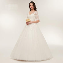 Load image into Gallery viewer, Ball Gown Wedding Dresses Bridal Ivory Long Sleeve V Neck Appliqued Floor Length Lace Up Bridal Gown Plus Size WN2630